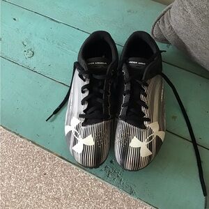 Under Armour kick sprint spike.